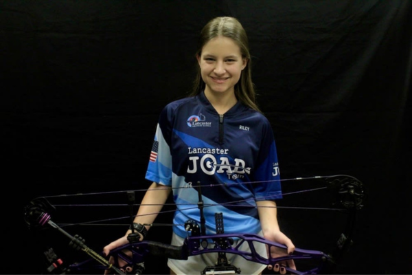 Student Riley Paul is a competitive archer