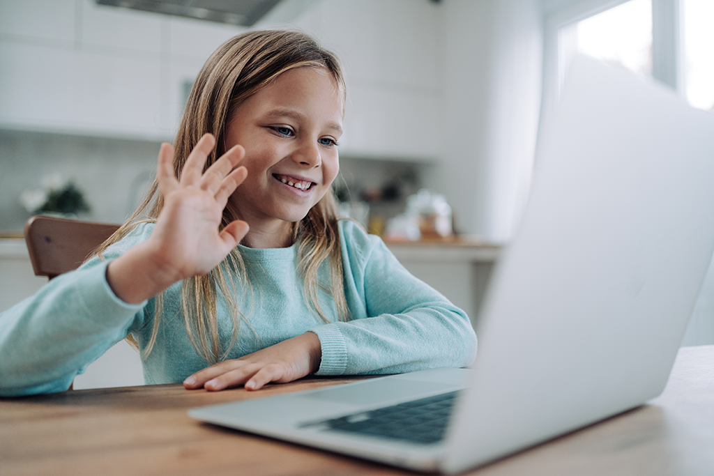 Student and teacher collaborating one-on-one in personalized online learning session